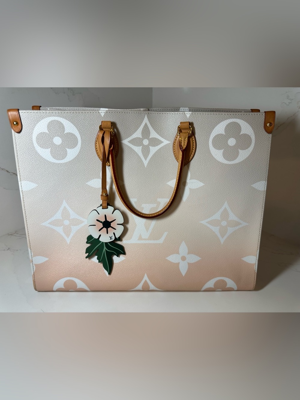 Louis Vuitton OnTheGo GM "By The Pool" in Brume / Peach